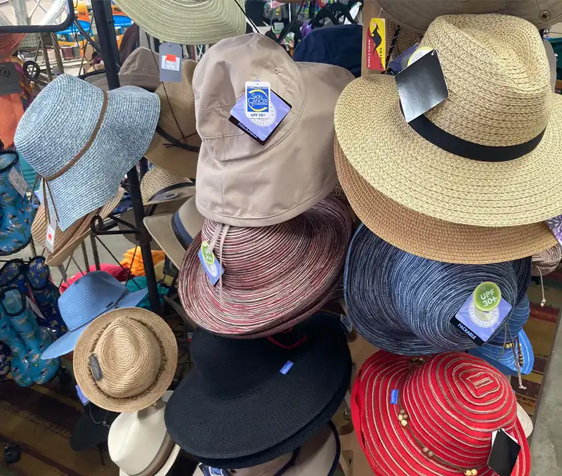 Rack of sun hats are some of the garden products that can be found at The Dutch Plant Farm store.