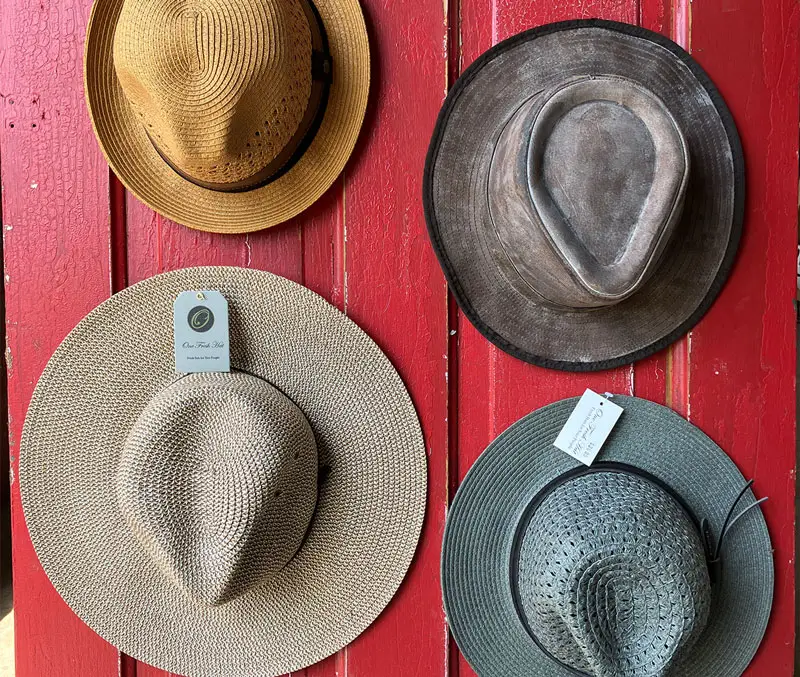 Display of gardening hats are some of the gardening accessories available at The Dutch Plant Farm store.