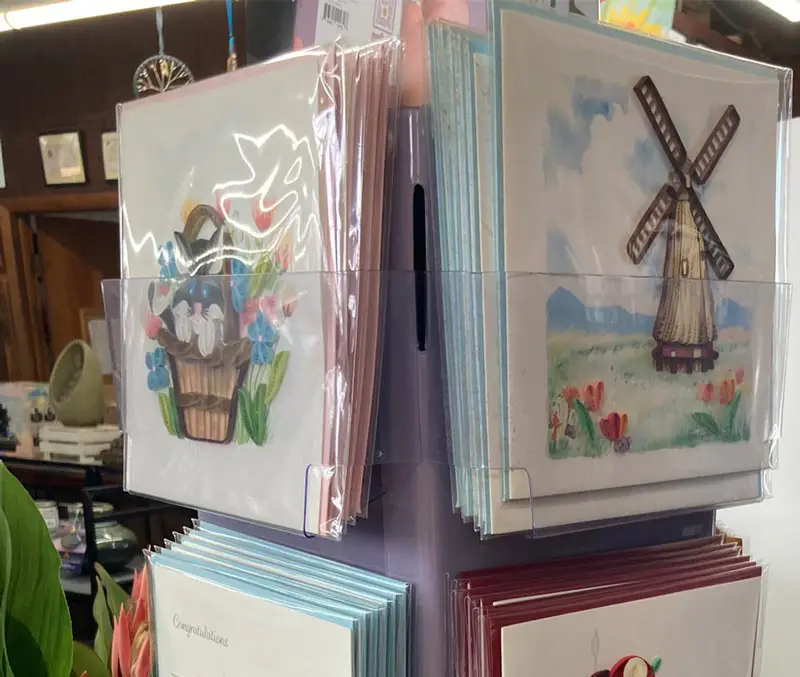 Greeting cards with pictures of a windmill and a flower basket are some of the gifts available at The Dutch Plant Farm store.