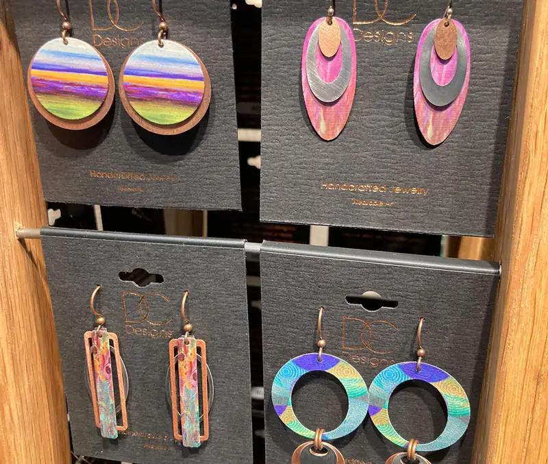 Display of colorful oval and round-shaped earrings are some of the accessories available at The Dutch Plant Farm store.