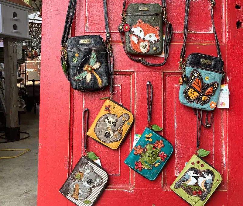 Display of small purses and coin holders with animals are some of the fun accessories available at The Dutch Plant Farm store.