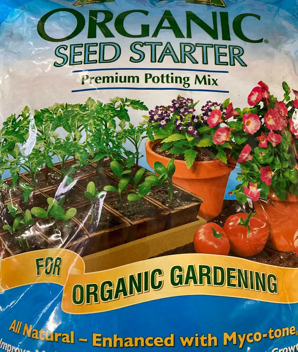 Bag of organic seed starter soil with illustrations of seedlings in peat pots and flowers in pots at The Dutch Plant Farm